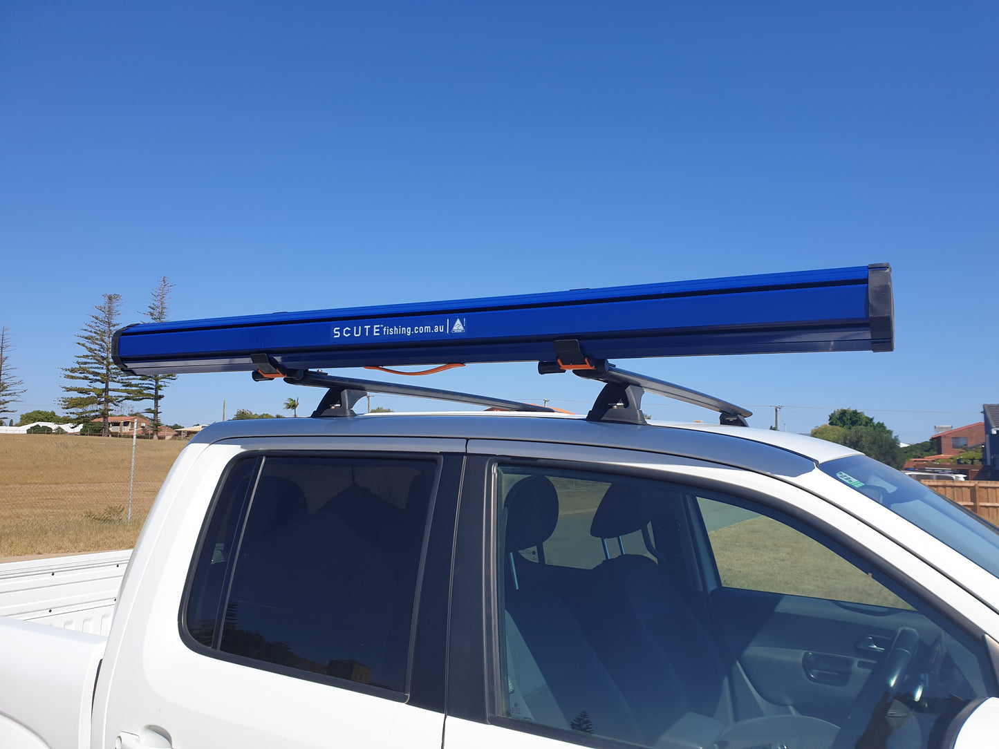 SCUTE fishing rod case storage on roof rack side view